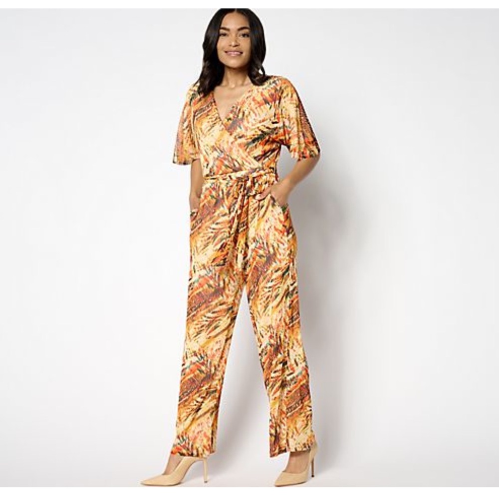 Attitudes by Renee Como Jersey jumpsuit w/mesh overlay. Medium
